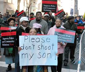 Tens of thousands march against police killings