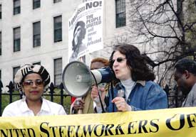 Rachel Nasca speaking at a May 1, 2006,<br>rally for immigrant rights in Boston. 