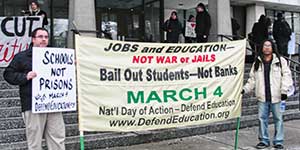 Michigan State University students, workers<br>rally and march on Feb. 3. 