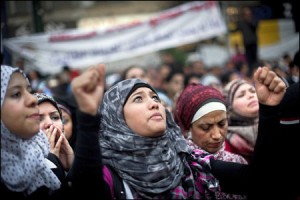 Egyptians demonstrate against President Morsi demanding that he withdraw decrees that usurp powers from the judiciary.