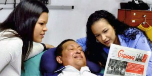 President Chávez's first public photo since his surgery in December. Taken Feb. 14 in Cuba, the smiling president is seen with his daughters Rosa Virginia and María Gabriela.