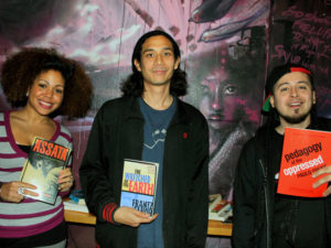 Rebel Diaz Arts Collective members Claudia De la Cruz and Rodrigo Venegas (right) joined with Sky Cohen (center), from the bookstore Bluestockings, to create a new library.
