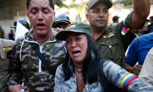 People in dozens of cities around the world held vigils and organized other expressions of solidarity with the people of Venezuela, shown here in Caracas. At least 16 countries decreed mourning periods from three to seven days, including Cuba, China, Ecuador, Haiti, Iran, Nicaragua, Nigeria, Peru, Uruguay, Dominican Republic, Argentina, Belarus, Bolivia, Brazil and Chile.