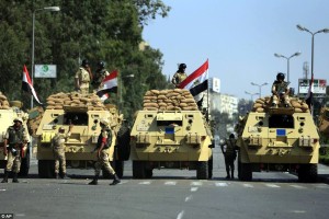Egyptian Army guards road near Presidential Palace, one day after July 3 coup.