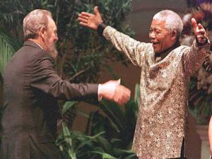 Nelson Mandela and Fidel Castro meet in Durban in 1998 for Non-Aligned Movement Summit.