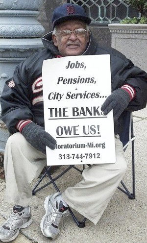 One of many protesters outside federal bankruptcy court, Oct. 28.WW photo: Kris Hamel