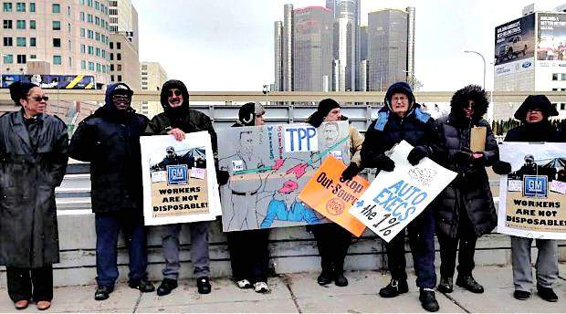 Rank-and-file autoworkers and supporters of the Autoworker Caravan protest the “gigantic profits” of auto companies Jan. 10 outside the North American International Auto Show in Detroit.