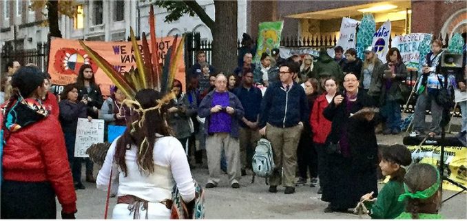 Mahtowin Munro of United American Indians of New England (UAINE) speaking at Boston rally for Standing Rock.