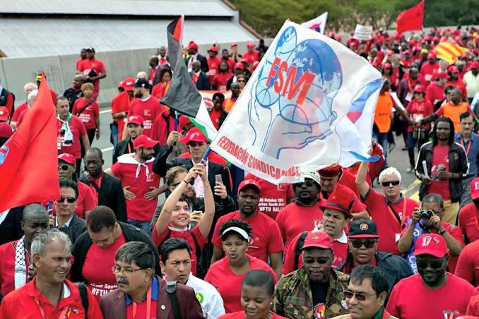 Workers march in Durban, Oct. 8.