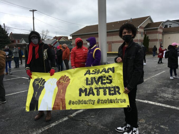 Hundreds rally, march against racist violence