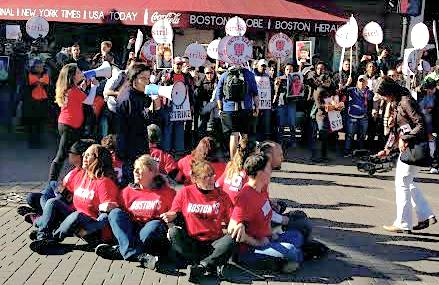 Food service workers arrested in civil disobedience during Harvard University Strike.
