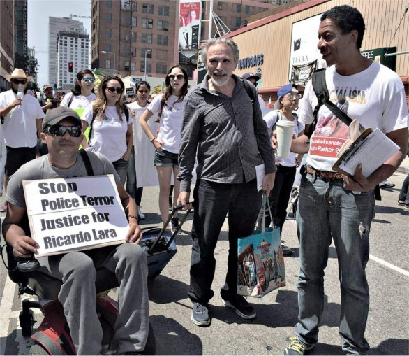 John Parker, on right, at May Day rally in Los Angeles.