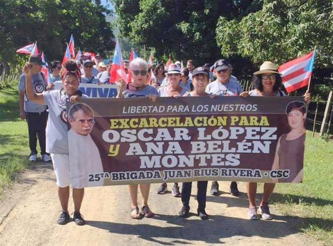 Puerto Rican Juan Rius Rivera Brigade of the Cuba Solidarity Committee during their last trip to Cuba, carrying a banner calling for the release of Oscar Lopez and Ana Belén Montes.