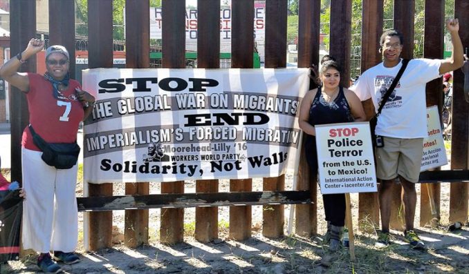WWP presidential candidate Monica Moorehead, former Mexican political prisoner Nestora Salgado, and Los Angeles WWP leader John Parker at apartheid wall dividing Nogales.
