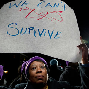 black-woman-minimum-wage-placard