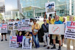 July 31 solidarity protest in front of GM world headquarters, Detroit.WW photo: Martha Grevatt
