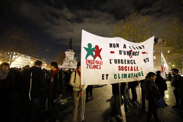 Paris, Nov. 26. The banner says "No to the state of emergency. The emergency concerns social and climate issues."