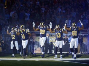 St. Louis Rams pro-football players, know the truth behind the slogan, ‘Hands up, don’t shoot.’ It’s what the corporate media wants to stop.