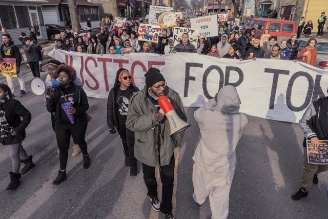 Nate Hamilton of Milwaukee’s Coalition For Justice joins protesters in Madison demanding justice for Tony Robinson and all victims of police terror, March 6.Photo: Joe Brusky